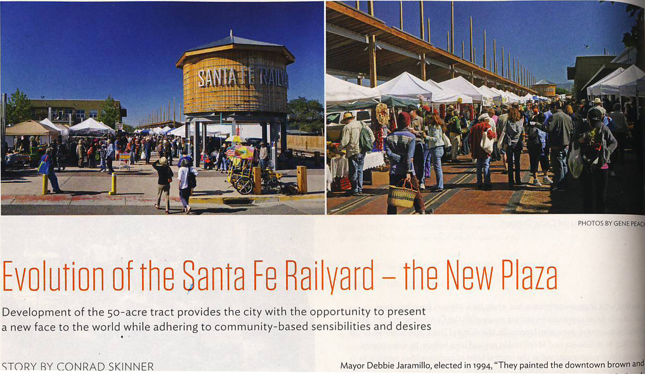 Magazine spread titled 'Evolution of the Santa Fe Railyard – the New Plaza' showing a bustling outdoor market at the Santa Fe Railyard with vendors and visitors near the iconic wooden water tower.