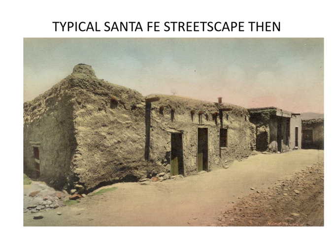 Historic streetscape in Santa Fe, depicting traditional adobe buildings along a dusty road, reflecting the architectural heritage of the past.